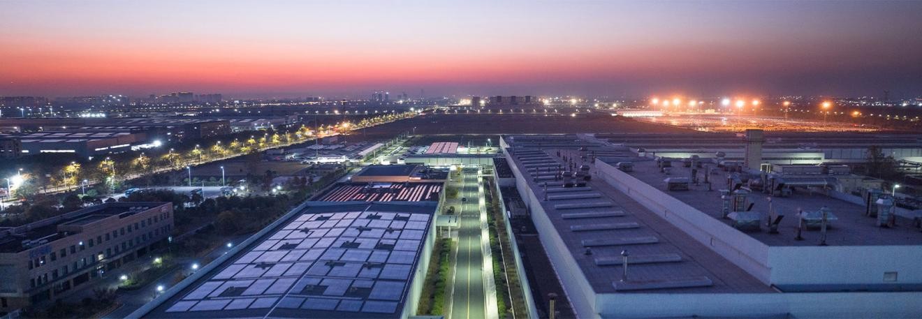 Solar PV array powering a manufacturing plant with sustainable energy.jpg